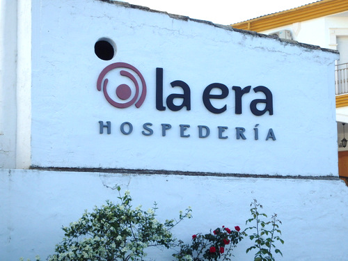 Hospedaria La Era - Note the Era Symbol, Arcs around a circle.